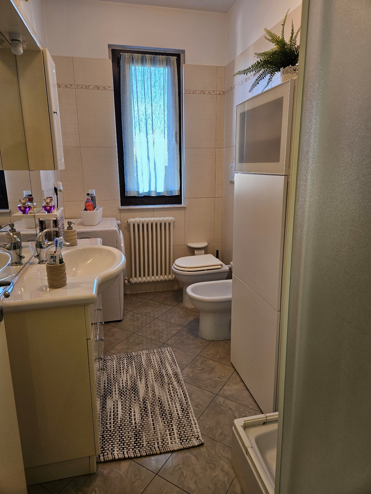 TRILOCALE IN PIENO CENTRO PANORAMICO CON GARAGE 6