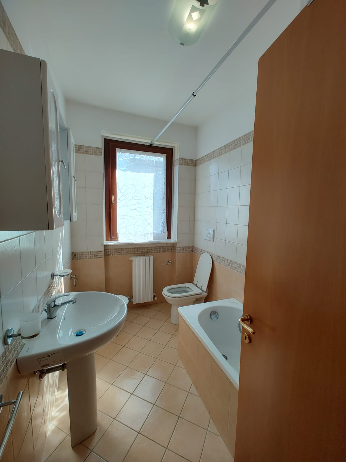 TRILOCALE CENTRALE CON GARAGE 12